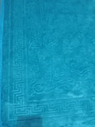 Alfombra azul turquesa de terciopelo
