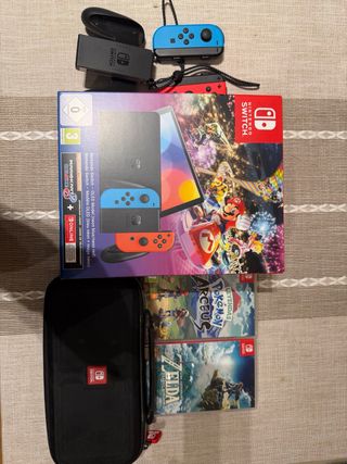 Nintendo Switch con juegos y funda
