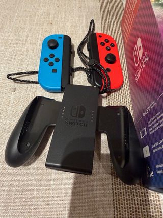 Nintendo Switch con juegos y funda