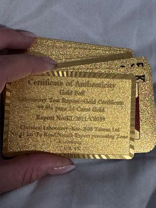 Baraja de cartas doradas oro