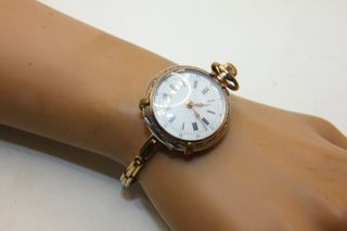 Esclusivo bracciale orologio argento oro fine 800