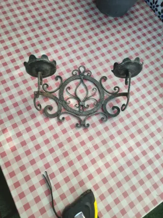 Candelabro da parete in ferro battuto