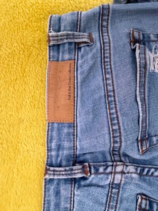 Calças de ganga rasgadas azuis