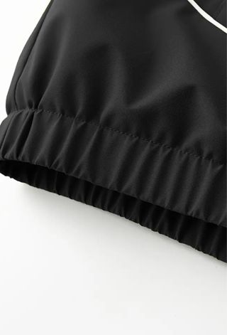 Chaqueta Deportiva Negra con Diseño