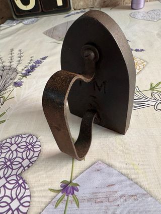 Plancha antigua de hierro fundido