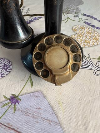 Teléfono antiguo candelabro