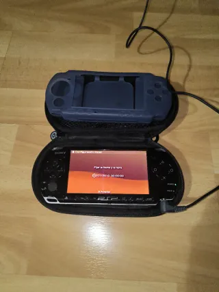 PSP Slim & Lite Piano Black Sony Protector y funda