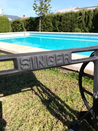 Pie de máquina de coser Singer