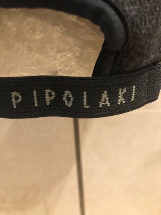 Gorra gris con orejeras Nueva a estrenar￼