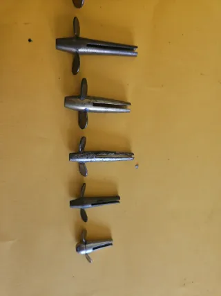 Antiguos DEBONES de pesca en bronce