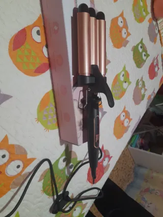 Rizador de pelo sin estrenar,incluye guante termic