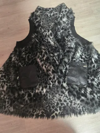 Colete do com padrão animal