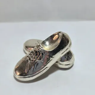 Miniatura scarpe in metallo argentato