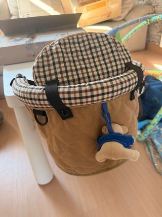 Trona bebe para mesa, plegable y de tela.