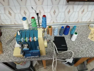 Remalladora Singer Profesional 14U23A