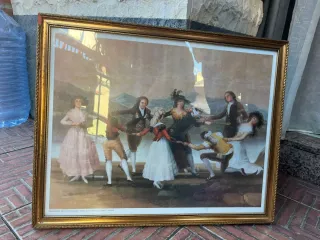 Quadro con cornice dorata