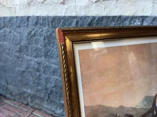 Quadro con cornice dorata