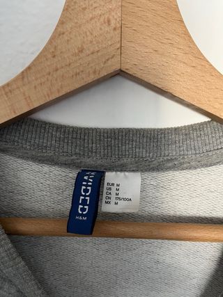Jersey H&M gris letras talla M