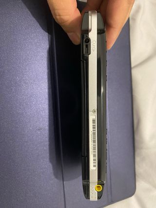 PSP Negra + 4 Juegos (Sin Batería/Cargador)