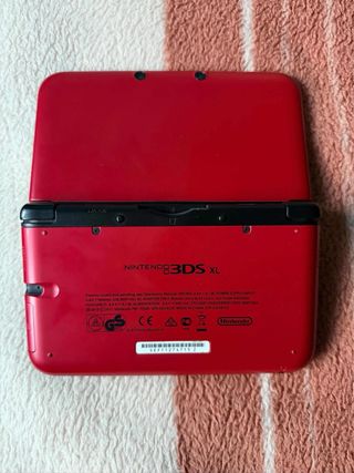 Nintendo 3DS xl roja con banco pokemon IMPOLUTA