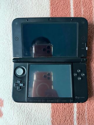 Nintendo 3DS xl roja con banco pokemon IMPOLUTA