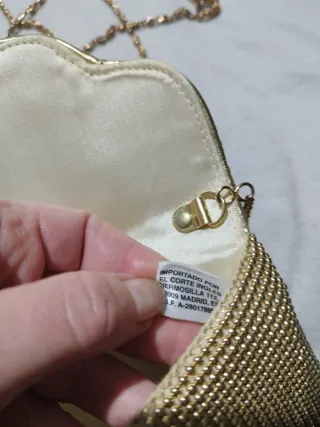 Bolso de fiesta dorado con cadena