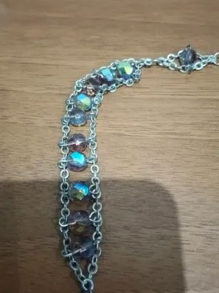 Rosario de cuentas moradas y cruz