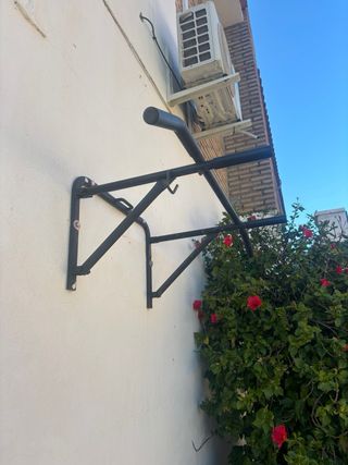 Barra de dominadas pared