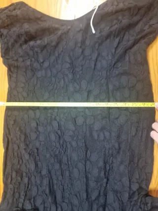 Traje de flamenca negro con mangas de encajes