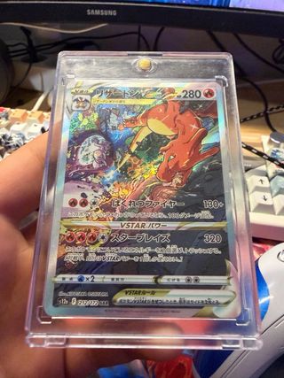 Mewtwo VSTAR PSA 9 y Charizard VSTAR JPN