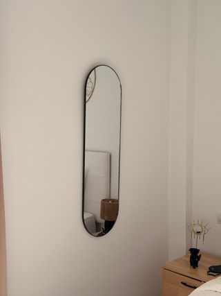 Espejo de pared ovalado negro