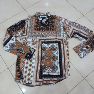 Set 12 anni: camicia fantasia e pantaloni beige