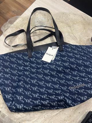 Bolso Desigual azul y gris con estampado