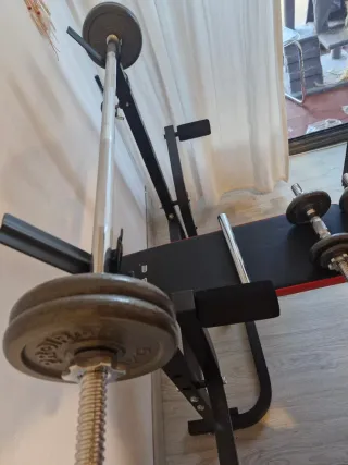 Banco de pesas con discos