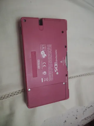 Nintendo DS rosa + Super Mario Bros + cargador
