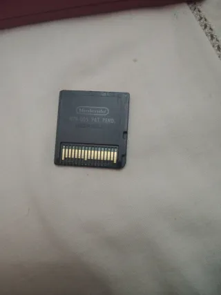 Nintendo DS rosa + Super Mario Bros + cargador