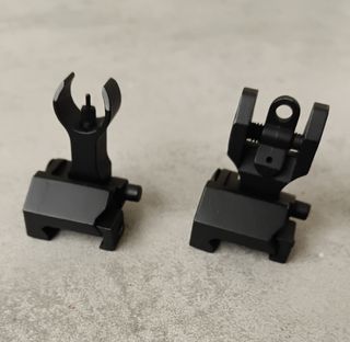 Tacche di mira in metallo