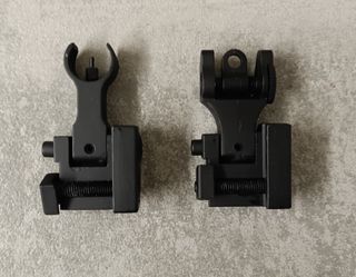 Tacche di mira in metallo