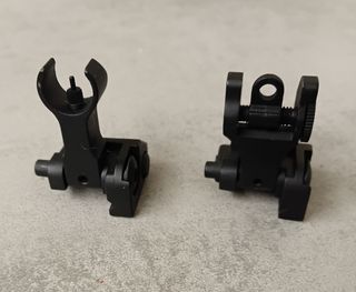 Tacche di mira in metallo