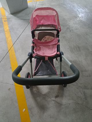 Carrito de bebé de juguete rosa