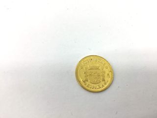 moneda oro 24k con 0