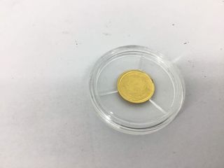 moneda oro 24k con 0