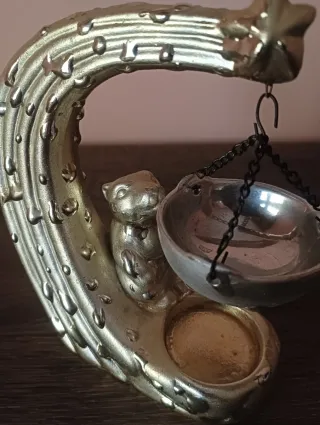 Portavelas de metal dorado y plateado