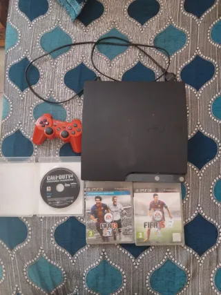 Consola PS3 con mando y 3 juegos