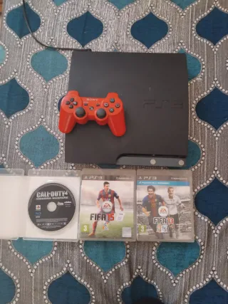 Consola PS3 con mando y 3 juegos