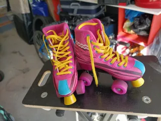 Patines 4 Ruedas rosa y en Línea