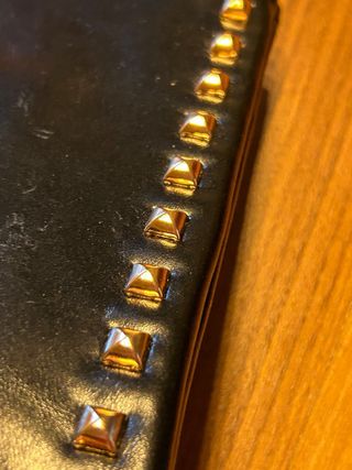 Busta nera con borchie Mia Bag