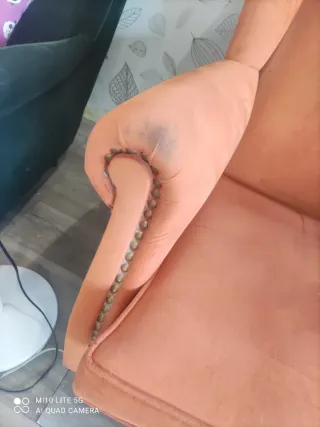 Sofá naranja y verde.solo Ávila Ávila