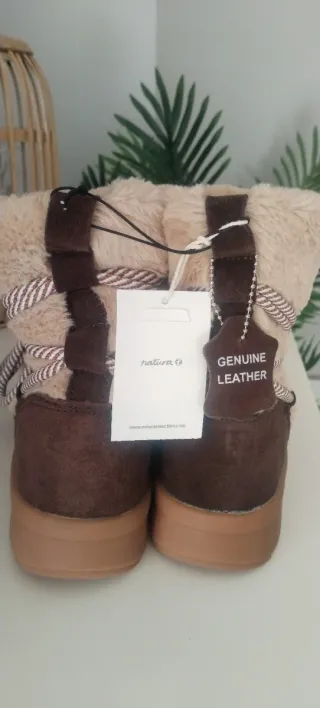 Botines de pelo beige y marrón