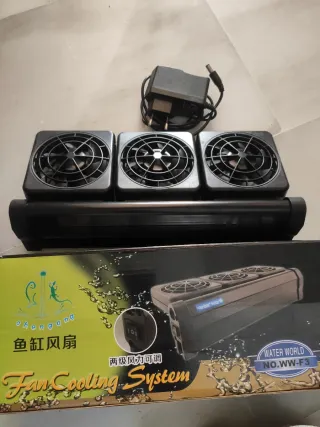 Lote acuario: calentador , ventilador y piedra